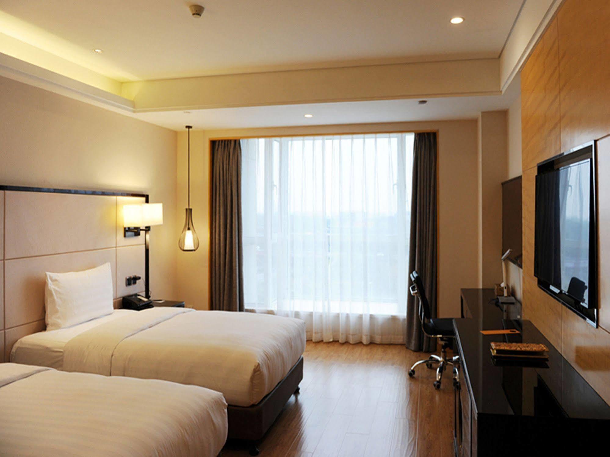 Hotel Pullman Qingdao Ziyue Exteriér fotografie